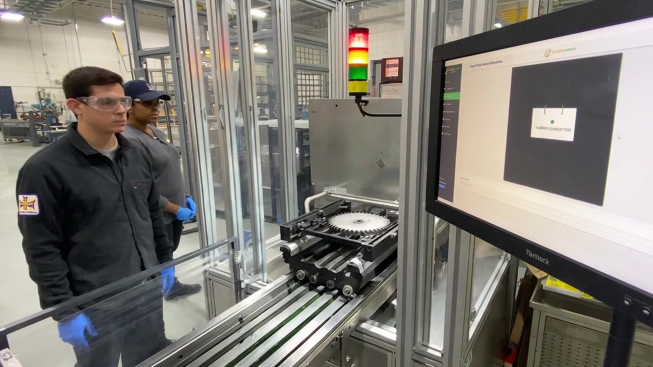 Machined gear under controlled inspection lighting